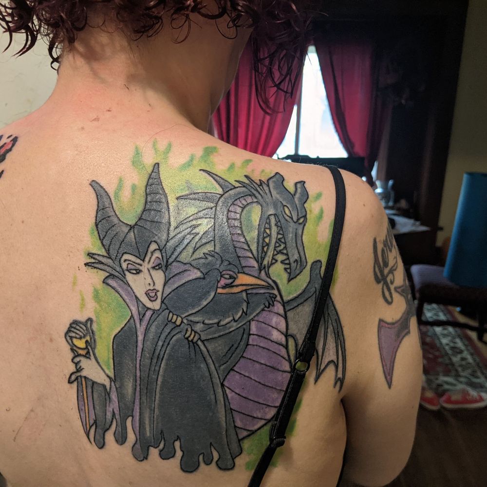 Stranci Tattoo & Piercing - Malificient received a new outline. This tattoo is a cover which is why it's so dark. But I love it . - Piercing Near Me - Cleveland, Ohio Stranci Tattoo & Piercing - Malificient received a new outline. This tattoo is a cover which is why it's so dark. But I love it . - Piercing Near Me - Cleveland, Ohio