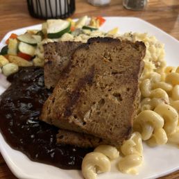 Meatloaf with mash, mac and cheese and veggies that tasted like they were from a steamer bag.