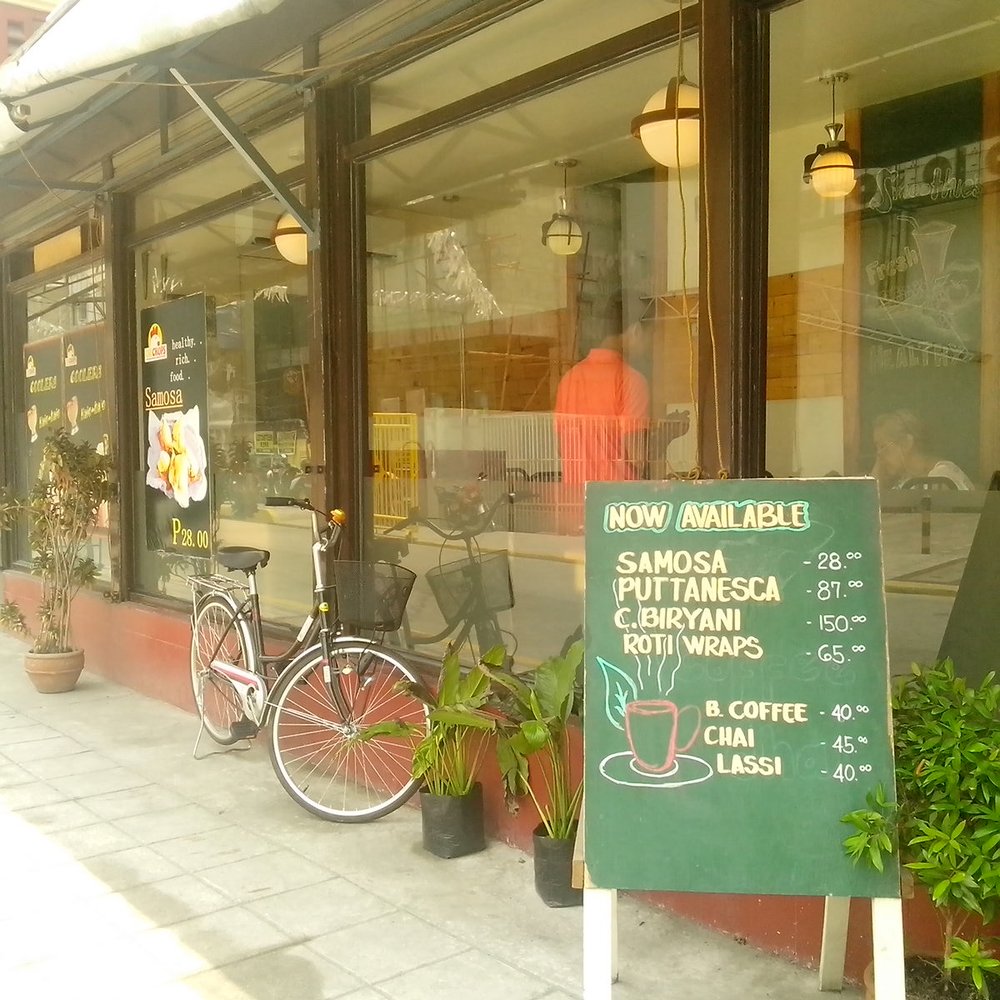 ChiChops - Not sure if the bike was just parked there but it makes the front look nice. - Chicken Shop Near Me - Makati, NCR