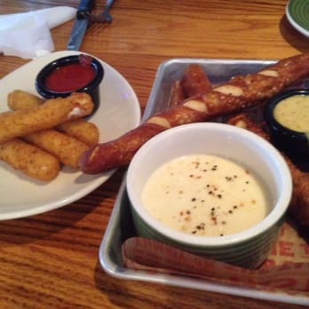 Applebee's Grill + Bar - Appetizer- mozzarella sticks and Pretzel sticks with Beer cheese. - American Near Me - Hodgkins, Illinois Applebee's Grill + Bar - Appetizer- mozzarella sticks and Pretzel sticks with Beer cheese. - American Near Me - Hodgkins, Illinois