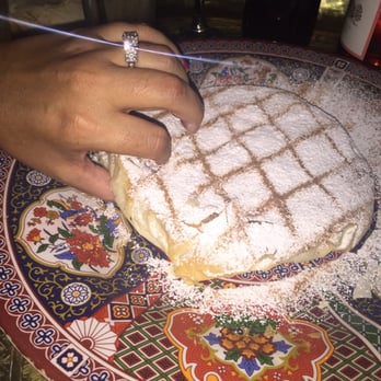 Marrakesh Restaurant - Fingers only for the B'stella. Be careful- it's hot from the kitchen! - Moroccan Near Me - Philadelphia, Pennsylvania