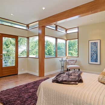 Dyna Contracting - a bedroom with a large bed - General Contractors Near Me - Seattle, Washington Dyna Contracting - a bedroom with a large bed - General Contractors Near Me - Seattle, Washington