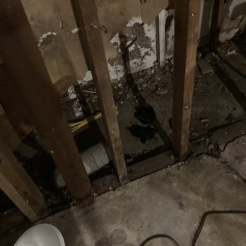 FirstKey Homes - Hole under the stairs, going to the basement where the washer and dryer connected - Real Estate Services Near Me - Marietta, Georgia