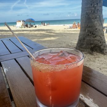 Numero Uno Beach House - Sober Pirate Mocktail (ginger, strawberry, lime and soda water) - Caribbean Near Me - San Juan, Puerto Rico Numero Uno Beach House - Sober Pirate Mocktail (ginger, strawberry, lime and soda water) - Caribbean Near Me - San Juan, Puerto Rico