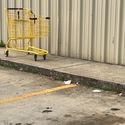Dollar General - Parking lot need little picking up it that way all the way around.