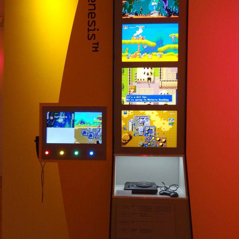 Frost Art Museum - The Art of Video Games exhibit. Here is the Genesis gaming console with sample games involving action, target, adventure, and tactics. - Art Museums Near Me - Miami, Florida