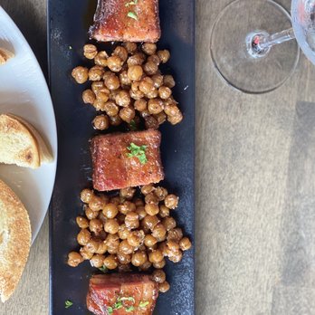 Black Walnut - Crispy Bacon Slab with Garbanzo Beans - New American Near Me - Oklahoma City, Oklahoma Black Walnut - Crispy Bacon Slab with Garbanzo Beans - New American Near Me - Oklahoma City, Oklahoma