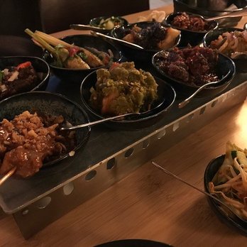 Sampurna - spicy Kuning rice table - Indonesian Near Me - Amsterdam, New Hampshire Sampurna - spicy Kuning rice table - Indonesian Near Me - Amsterdam, New Hampshire