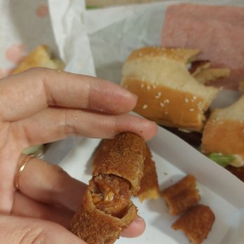 Burger King - ...this is supposedly what Burger King advertises as "mozzarella sticks" ... why are they old and dry...and why is the cheese brown? - Fast Food Near Me - Saint Petersburg, Florida Burger King - ...this is supposedly what Burger King advertises as "mozzarella sticks" ... why are they old and dry...and why is the cheese brown? - Fast Food Near Me - Saint Petersburg, Florida