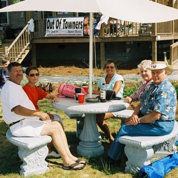 Grapefull Sisters Vineyard - a family sitting at a picnic table - Wineries Near Me - Tabor City, North Carolina Grapefull Sisters Vineyard - a family sitting at a picnic table - Wineries Near Me - Tabor City, North Carolina