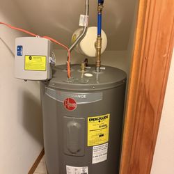 American Home Repairs & Installations - Water heater and expansion tank.