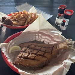 Locklear's on Little Oak - Headless flounder with hush puppies and fries