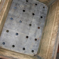 Cheap Vintage - Inside the old milk crate is a metal bottom