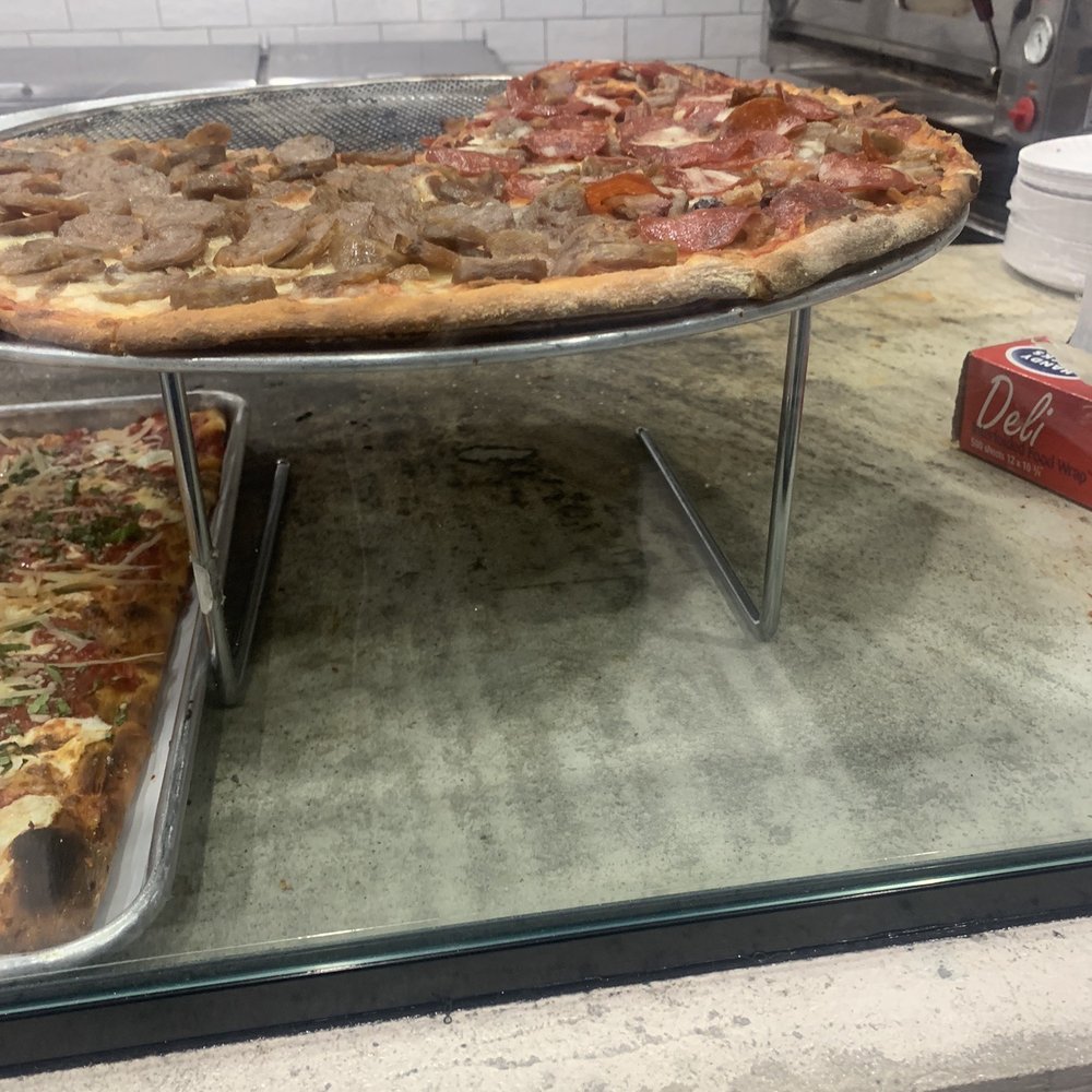 The Swiss Slice - Sad pies - Pizza Near Me - Brooklyn, New York The Swiss Slice - Sad pies - Pizza Near Me - Brooklyn, New York