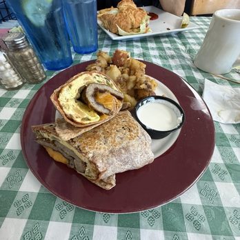 Alice's Kitchen - Sausage, egg, and cheese burrito with homemade sour cream and home fries - Breakfast & Brunch Near Me - Sea Bright, New Jersey Alice's Kitchen - Sausage, egg, and cheese burrito with homemade sour cream and home fries - Breakfast & Brunch Near Me - Sea Bright, New Jersey