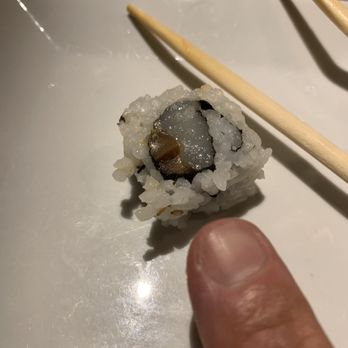 OC Wasabi - Roll with my fingertip for size comparison. Such a small roll. - Sushi Bars Near Me - Ocean City, Maryland OC Wasabi - Roll with my fingertip for size comparison. Such a small roll. - Sushi Bars Near Me - Ocean City, Maryland
