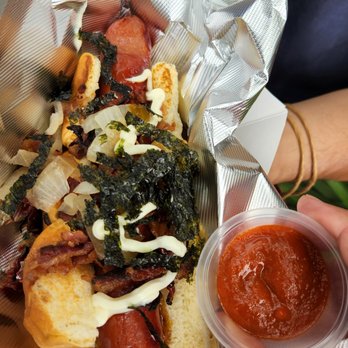 Road Dogs - Kamikaze dog (w/ Sriracha on side) - Hot Dogs Near Me Road Dogs - Kamikaze dog (w/ Sriracha on side) - Hot Dogs Near Me