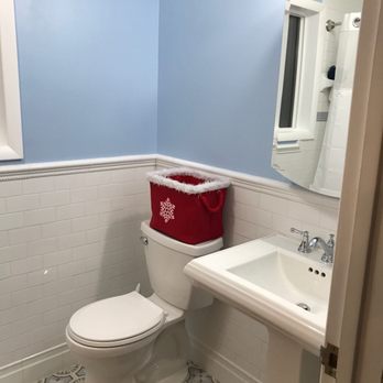 Edward Construction - a bathroom with a toilet and sink - General Contractors Near Me - Pittsburgh, Pennsylvania