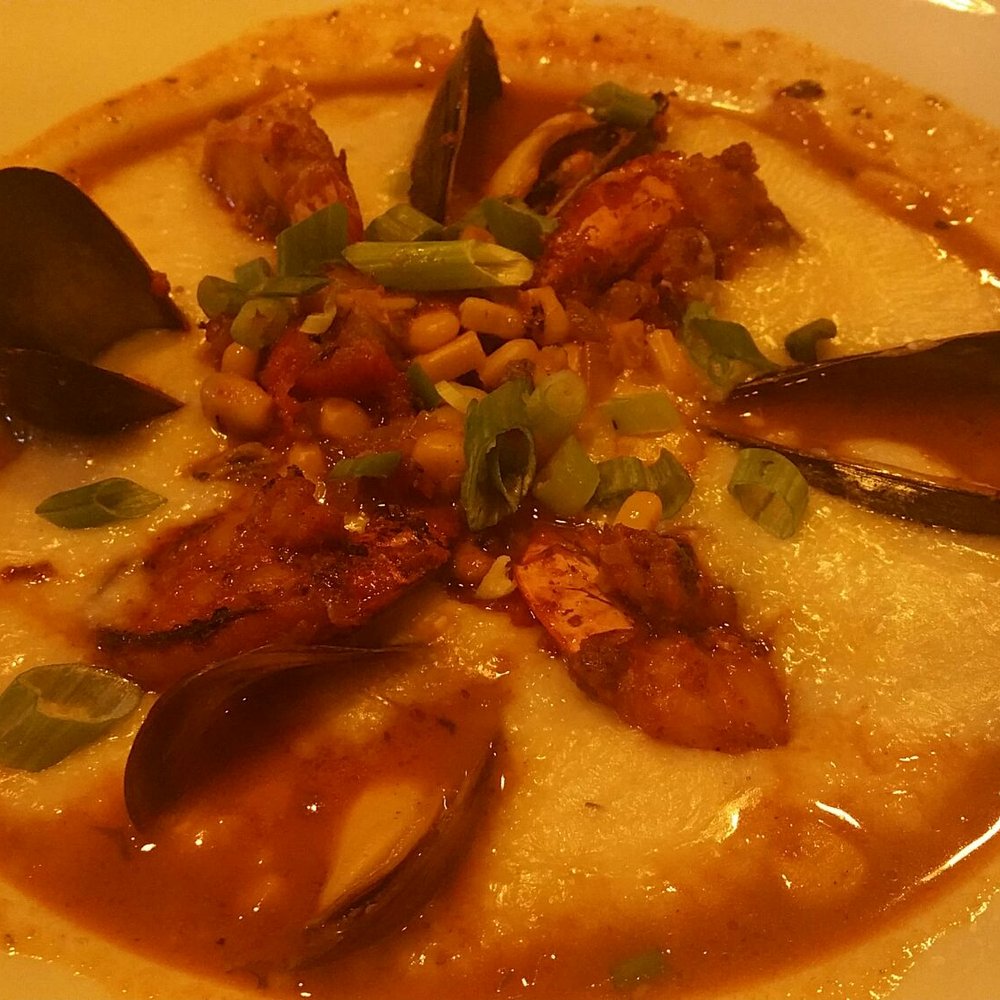 Door FiftyFive - Blackened Shrimp and Gumbo Cheddar Grits. I feel in love with the cheddar grits and the tomato broth: savoury goodness. - Southern Near Me - Mississauga, Ontario Door FiftyFive - Blackened Shrimp and Gumbo Cheddar Grits. I feel in love with the cheddar grits and the tomato broth: savoury goodness. - Southern Near Me - Mississauga, Ontario