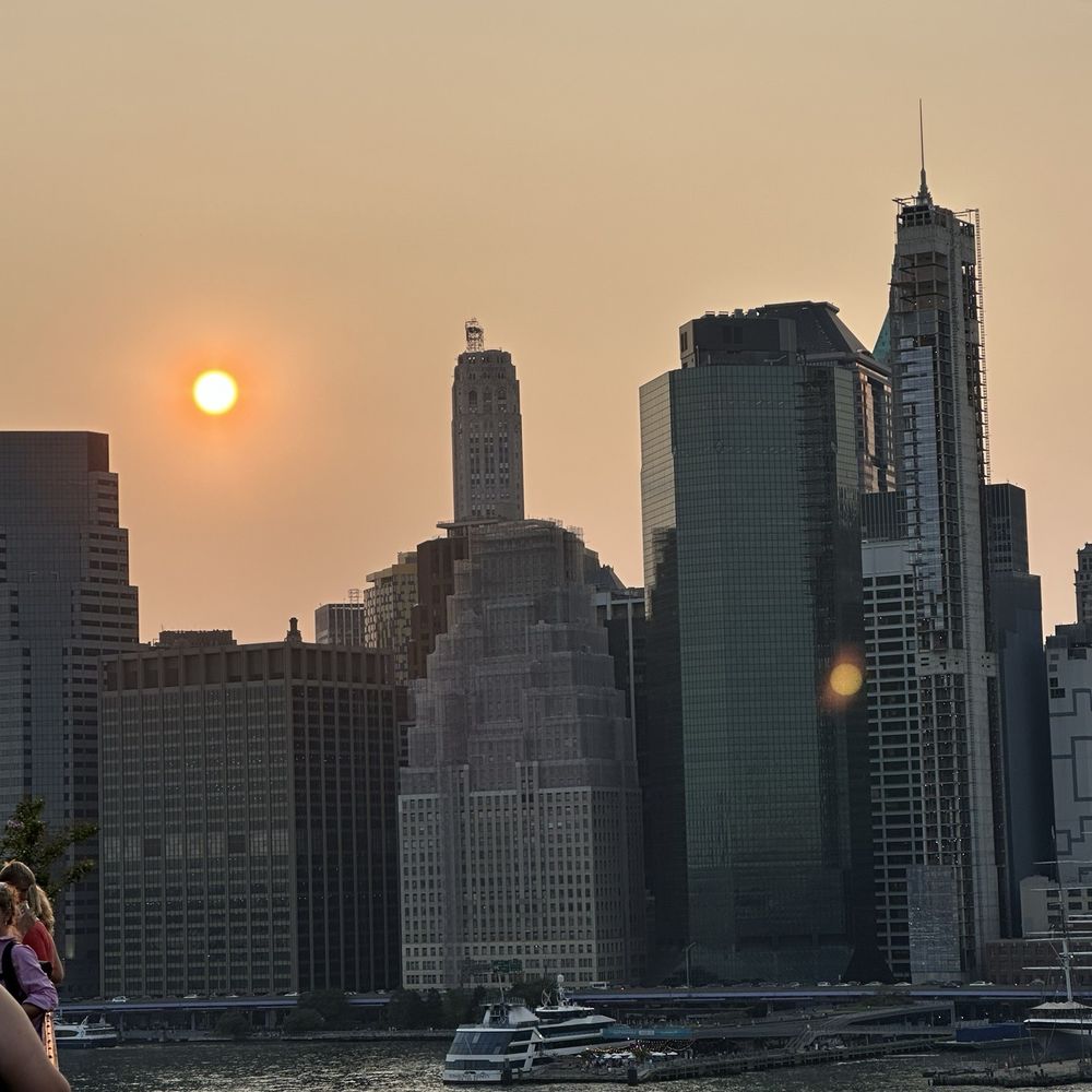 Harriet's Rooftop - Sunset over buildings - Lounges Near Me - Brooklyn, New York