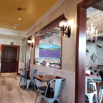 Paris Bistro - View into the "Provence room" with lavender fields mural - French Near Me - Naperville, Illinois