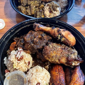 Back A Yard - Oxtail and chicken combo in front. Goat curry and salmon combo in the back. - Caribbean Near Me - San Jose, California Back A Yard - Oxtail and chicken combo in front. Goat curry and salmon combo in the back. - Caribbean Near Me - San Jose, California