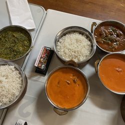 Family Vansa Ghar Restaurant - From left to right: Paneer Sag, Lamb Korma, chicken tikka Chicken Tika Masala, Goat Curry (upper right)