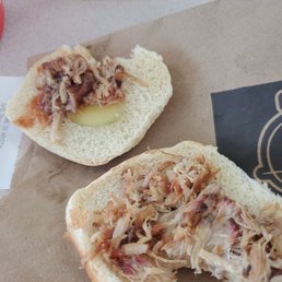 a half eaten sandwich with a bite taken out of it