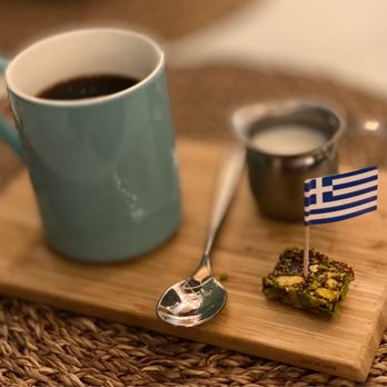 Elia - COFFEE served with a cute little pate de fruit with pistachios - Greek Near Me - Pleasanton, California