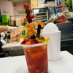 Tekila Ice Cream Shop - Rusa it has mix fruit, mineral water, chamoy, squirt, and much more stuff come in and try it .