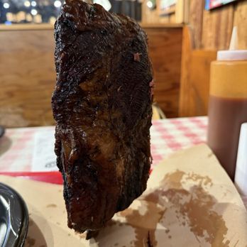 Black's Barbecue Lockhart - Dino bone - beef rib - Barbeque Near Me - Lockhart, Texas