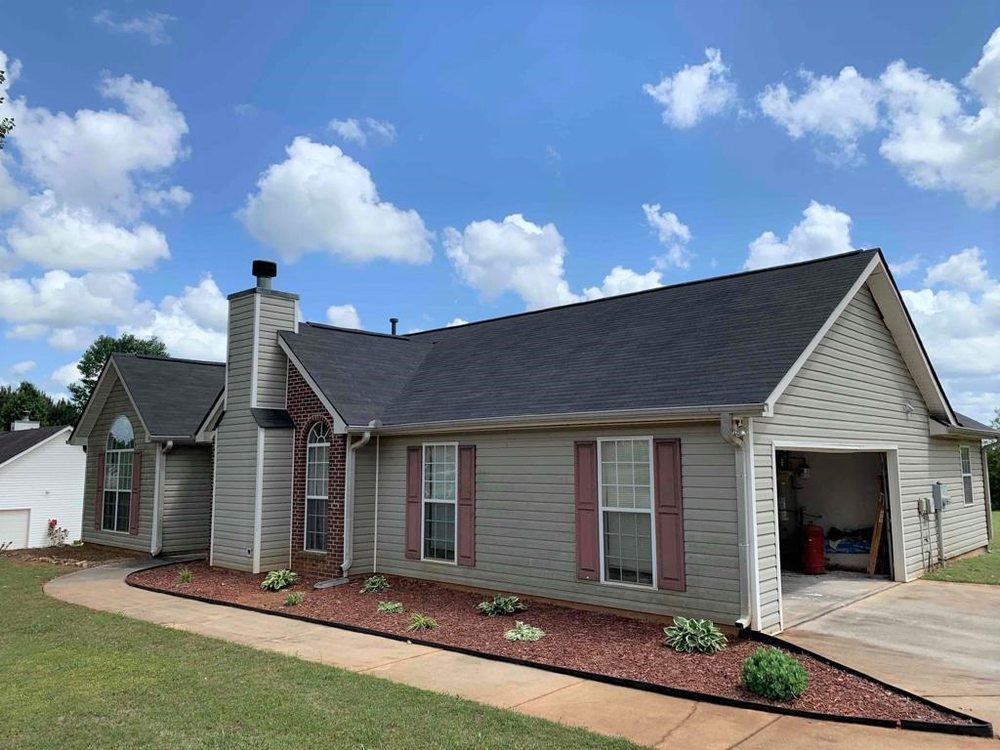 Slide of Rosser Roofing Solutions