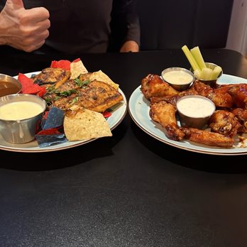 Tavern 76 - Taco special and crispy wings with honey bbq sauce - Sports Bars Near Me - White House, Tennessee Tavern 76 - Taco special and crispy wings with honey bbq sauce - Sports Bars Near Me - White House, Tennessee