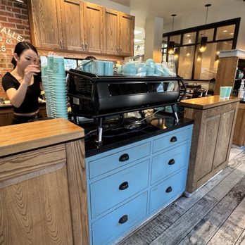 49th Parallel Coffee - Coffee machine station featuring their baristas - Coffee Roasteries Near Me - North Vancouver, British Columbia 49th Parallel Coffee - Coffee machine station featuring their baristas - Coffee Roasteries Near Me - North Vancouver, British Columbia