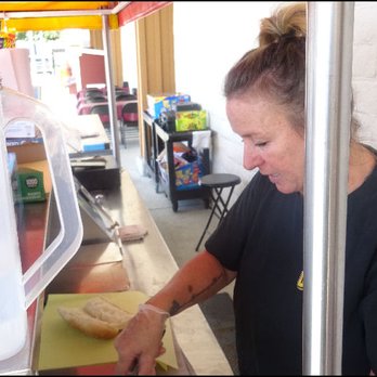 Doc's Dawgs - Renee grabbed a large quarter pound Miller's Dog from the grill, and placed it on a bun, ready for me to enjoy. - Hot Dogs Near Me - Sonora, California