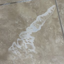 Before and after fixing damaged tile