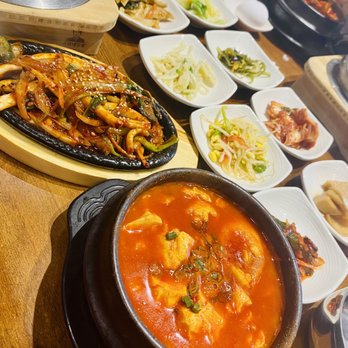 Chanmaru - squid bokkeum, galbi, & soontofu amongst various banchan (side dishes) - Korean Near Me - Carrollton, Texas