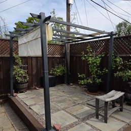 Old pergola. They chopped it up with a saw and hauled it out. Old pergola. They chopped it up with a saw and hauled it out.