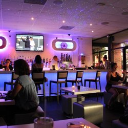 Go Fish - We arrived at Go Fish Sushi and were ushered back into the Lounge - the Lounge was a fun space with neon lighting.