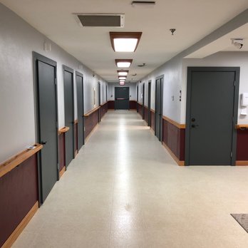 Klinghammer Construction - a long hallway leading to several doors - General Contractors Near Me Klinghammer Construction - a long hallway leading to several doors - General Contractors Near Me