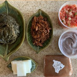 Kalei Poi - L to R: Laulau, Haupi'a, Kalua Pua'a, Lomilomi, Poi and Kūlolo. Yum. Yum. Yum.