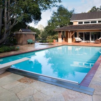 Mike Lewis Concrete Construction Inc - a pool in a backyard - General Contractors Near Me - Pacifica, California Mike Lewis Concrete Construction Inc - a pool in a backyard - General Contractors Near Me - Pacifica, California