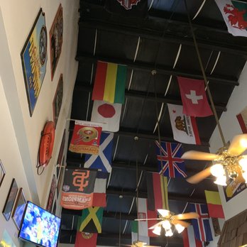 Eel River Brewing - Flags from sports teams & countries adorn the ceiling. - Pubs Near Me - Fortuna, California Eel River Brewing - Flags from sports teams & countries adorn the ceiling. - Pubs Near Me - Fortuna, California