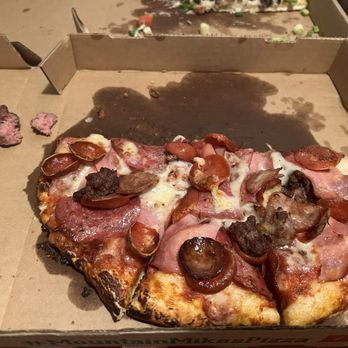 Mountain Mike's Pizza - Half eaten pizza with raw sausage on the side. - Pizza Near Me - Sacramento, California Mountain Mike's Pizza - Half eaten pizza with raw sausage on the side. - Pizza Near Me - Sacramento, California