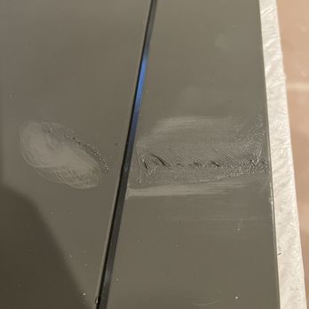 VIP Services - What the paint looked like before we had to complain to get it fixed on a cabinet - General Contractors Near Me - Wylie, Texas
