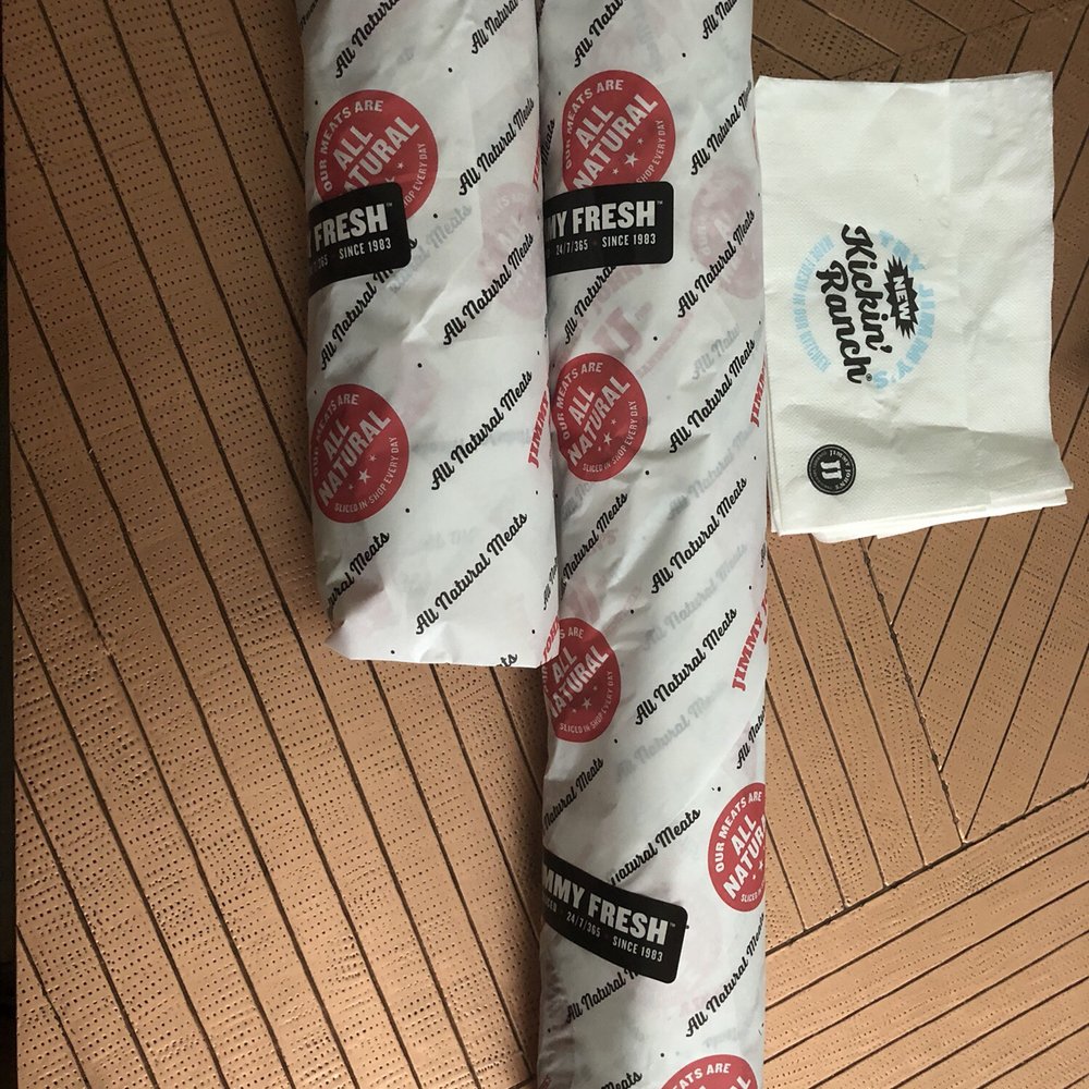 a pair of ties on a table a pair of ties on a table