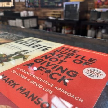 The Beer Hog - Bar top is composed of book covers. - Bars Near Me - Madison, Alabama The Beer Hog - Bar top is composed of book covers. - Bars Near Me - Madison, Alabama