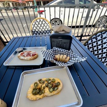 The Salted Knot - a table with two trays of food on it - Pretzels Near Me - Mesa, Arizona The Salted Knot - a table with two trays of food on it - Pretzels Near Me - Mesa, Arizona