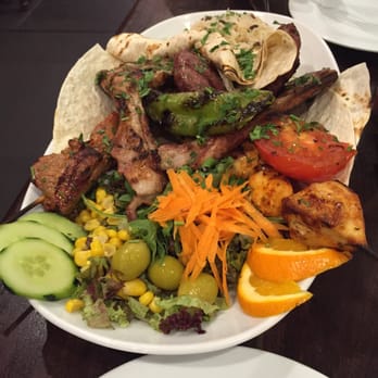Diván - Special plate with assortments of lambs, chicken kebabs, Turkish meat patties, salad, & naan - Kebab Near Me - Barcelona, B Diván - Special plate with assortments of lambs, chicken kebabs, Turkish meat patties, salad, & naan - Kebab Near Me - Barcelona, B