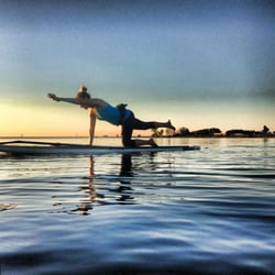 Flat Tide - SUP Yoga at Sunset, Beautiful way to calm the mind, challenge the body, and experience nature.